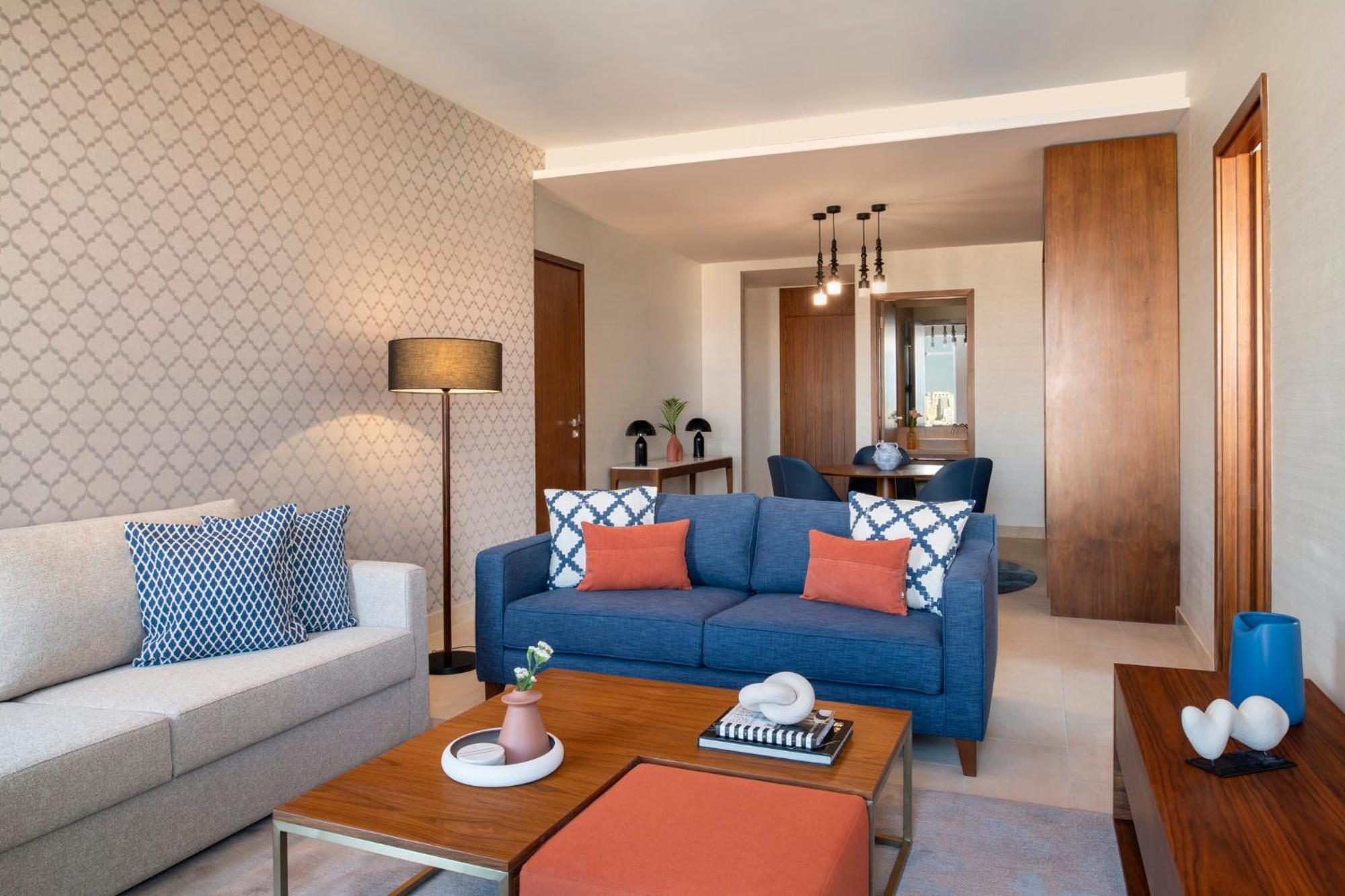 Abesq Doha Hotel And Residences, An Ihg Hotel Exteriér fotografie A living room at the hotel